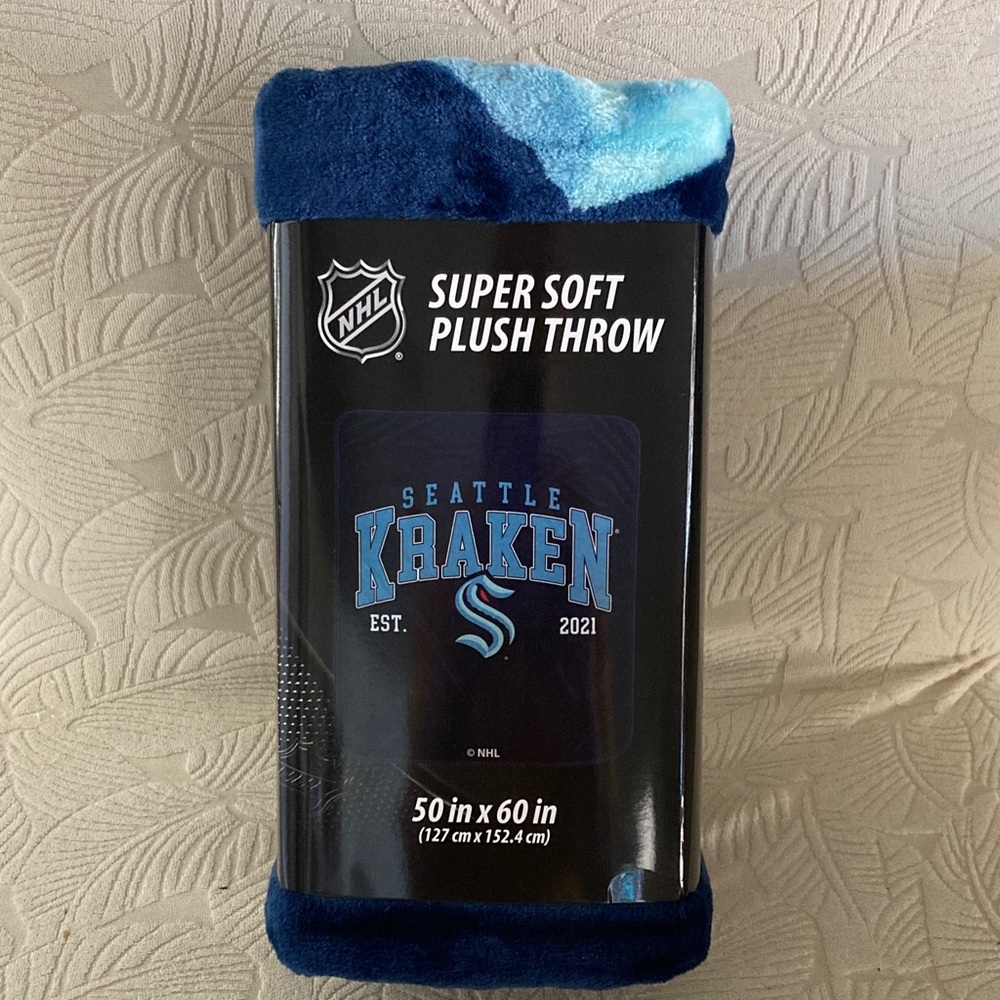 NHL Seattle Kraken blanket
Size is 50x60
Brand new, still in packaging
